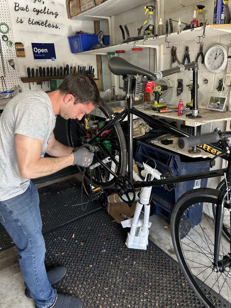 Luca assembling a Butter bike in the Toronto shop
